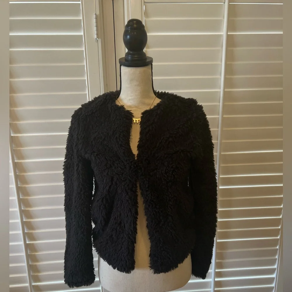 H&M fuzzy little jacket. Light, but fluffy. Slight shimmer in the fabric. - Picture 1 of 4